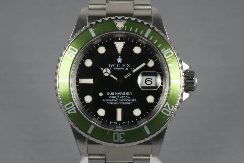 Rolex Explorer with iconic black dial -2004 Rolex Green Submariner 16610V with Box and Papers