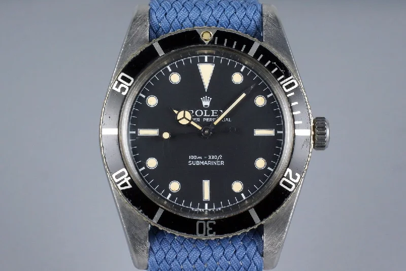 Rolex GMT-Master II with black and red bezel -1958 Rolex Submariner 5508 Service Dial