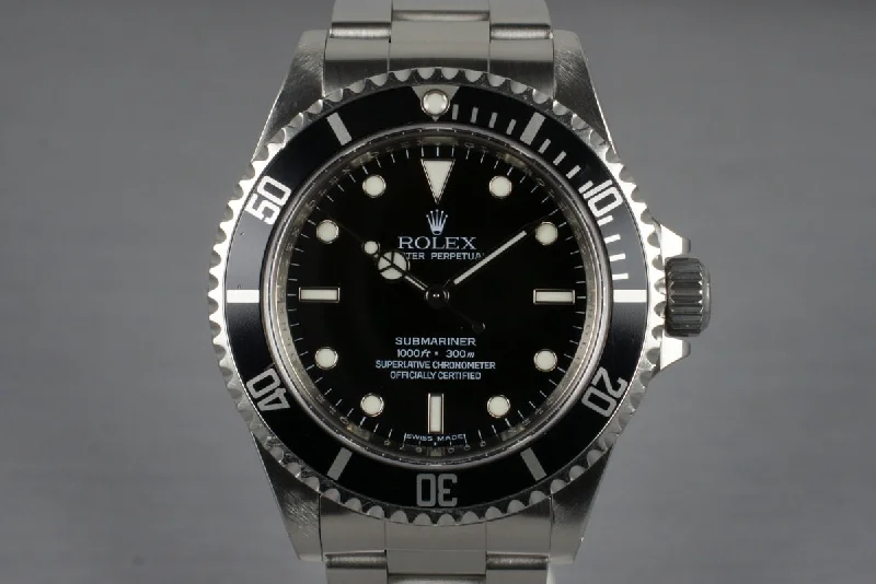 Rolex Submariner Date with black dial -2010 Rolex Submariner 14060 with 4 Line Dial