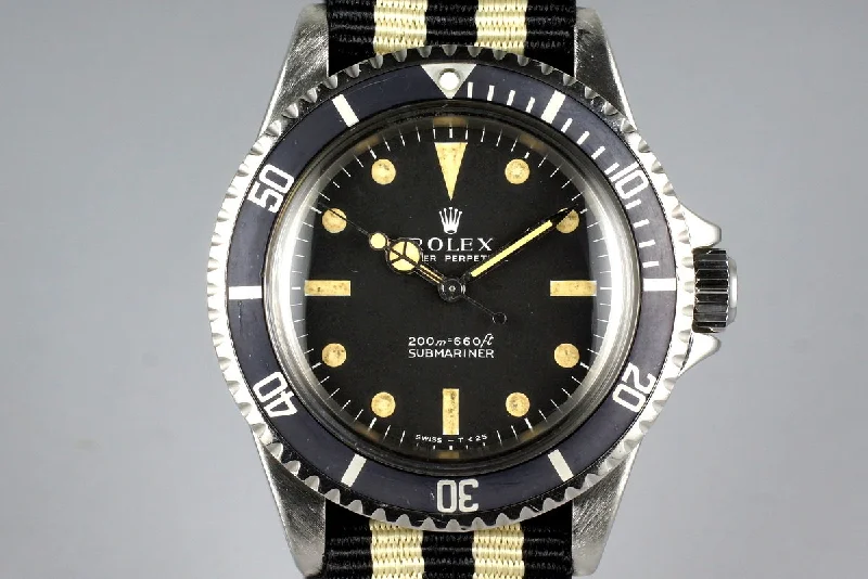 Rolex Oyster Perpetual with red dial -1967 Rolex Submariner 5513 Meters First