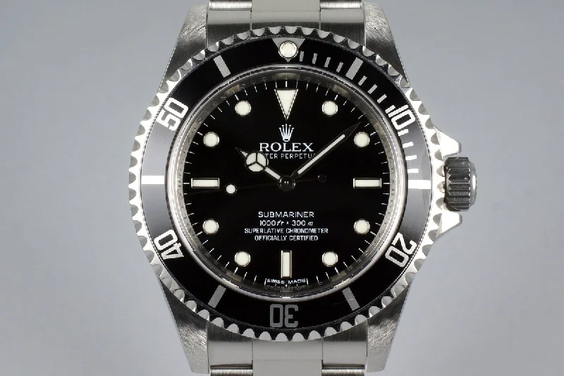 Rolex GMT-Master II with black dial -2012 Rolex Submariner 14060M 4 Line Dial with Box and Papers