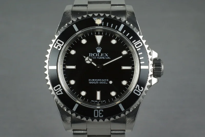 Rolex Submariner Date with gold accents -1995 Rolex Submariner 14060