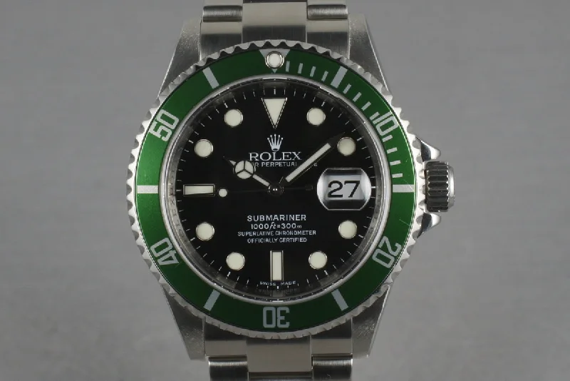 Rolex Day-Date with platinum features -Rolex Green Submariner 16610 LV with Box and Papers M serial