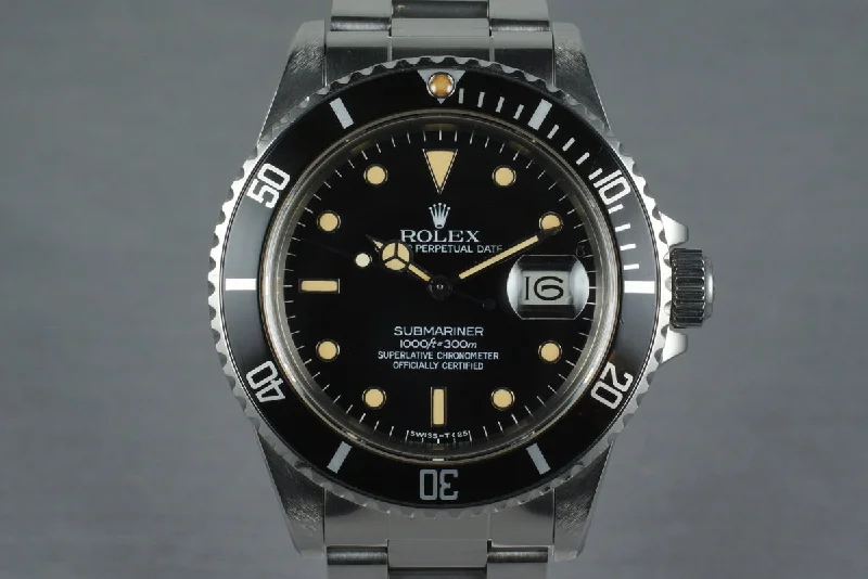 Rolex GMT-Master II with black bezel -1985 Rolex Submariner 16800