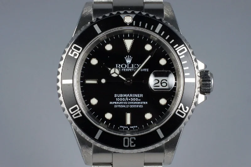 Rolex Oyster Perpetual with black dial -2001 Rolex Submariner 16610