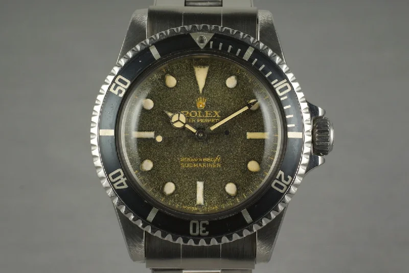 Rolex Explorer I with black bezel -1966 Rolex Submariner 5513 with Gilt Bart Simpson Dial