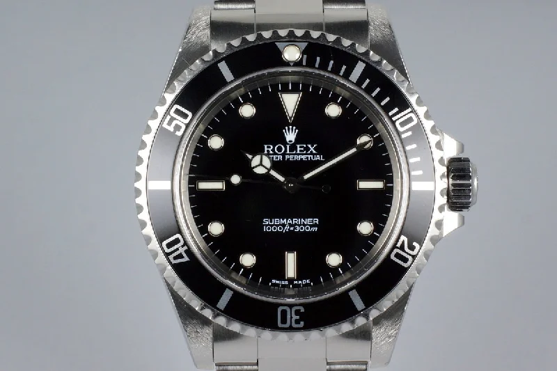 Rolex Day-Date with white gold case -2000 Rolex Submariner 14060