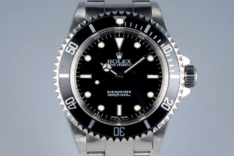 Rolex Oyster Perpetual with modern features -2002 Rolex Submariner 14060M with Box and Papers