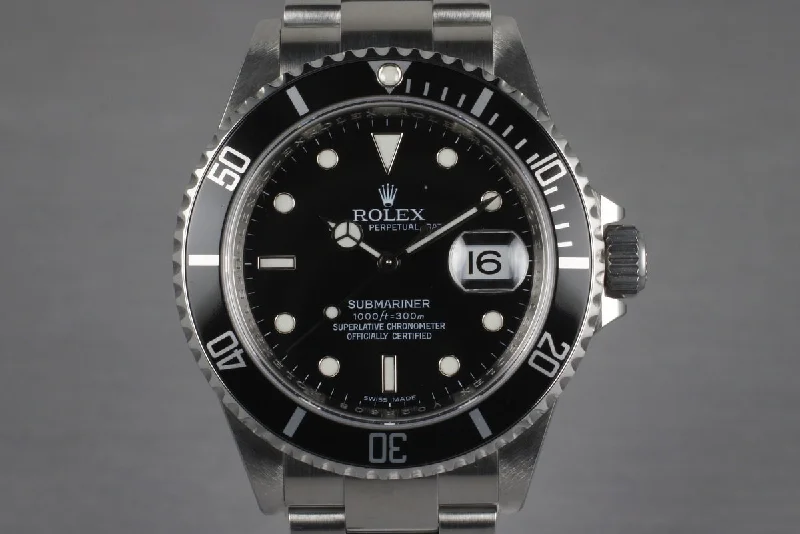 Rolex Submariner with red text -2009 Rolex Submariner 16610 with Box and Papers