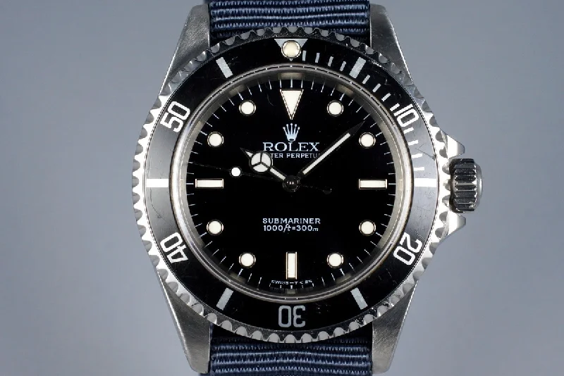 Rolex Air-King with black dial -1997 Rolex Submariner 14060