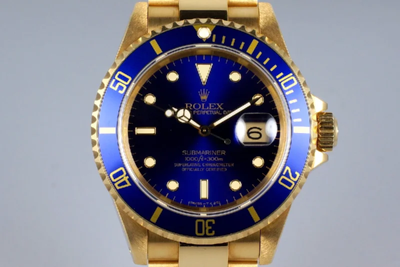 Rolex Submariner with vintage green bezel -1991 Rolex YG Submariner 16618 Blue Dial