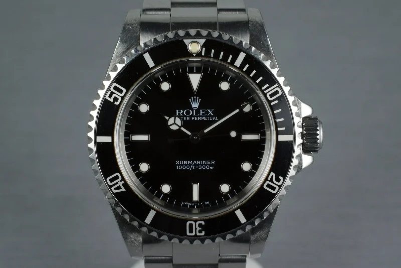 Rolex GMT-Master II with dual-time function -1997 Rolex Submariner 14060