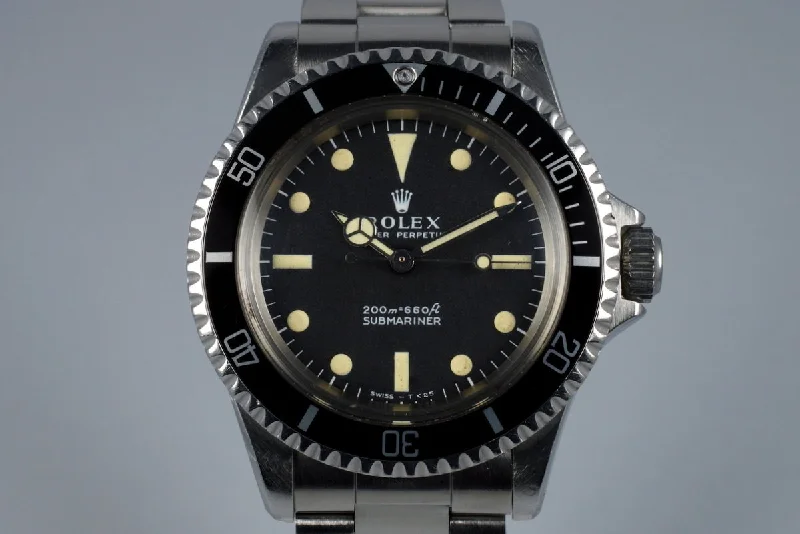 Rolex GMT-Master II with black dial and bezel -1966 Rolex Submariner 5513 Meters First Dial