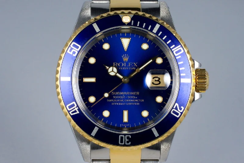 Rolex Datejust with diamond markers -1999 Rolex Two Tone Blue Submariner 16613 with Box and Papers