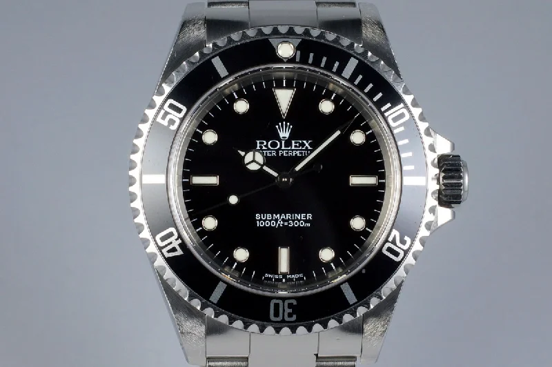 Rolex Day-Date 36mm with jubilee bracelet -2002 Rolex Submariner 14060M