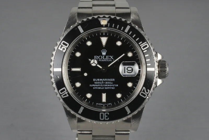 Rolex Submariner Date with green accents -1995 Rolex Submariner 16610 with Box and Papers