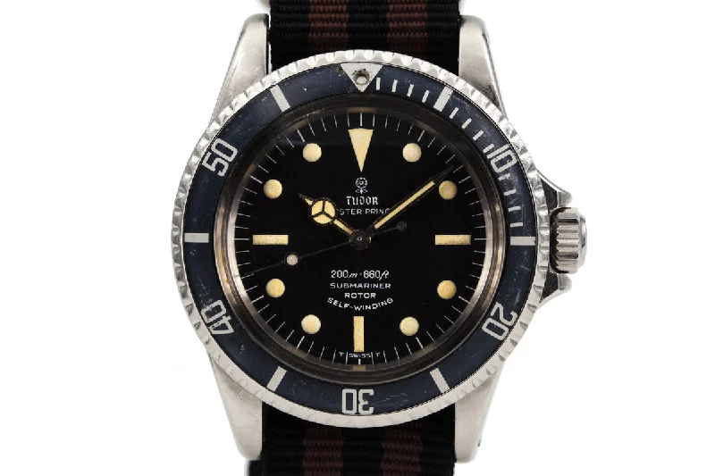 Rolex watches with rotating dive bezel -1964 Tudor Submariner 7928