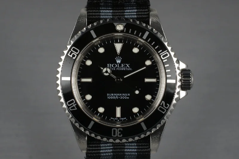 Rolex Datejust 36mm with diamond accents -2003 Rolex Submariner 14060M