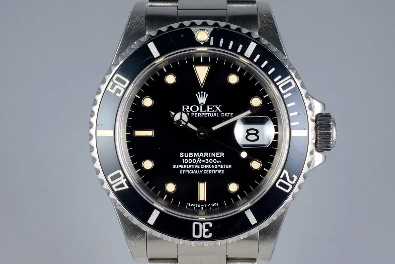 Rolex Day-Date with silver dial -1990 Rolex Submariner 16610 with Box and Papers